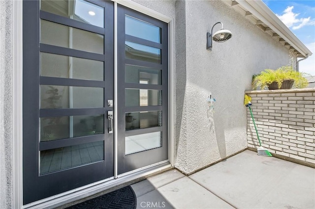 1938 N Frontier St, Hanford, CA 93230 - doorway to property with stucco siding and french doors