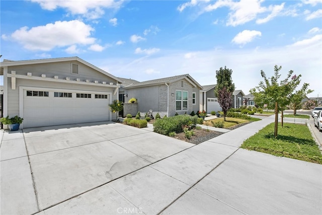 1938 N Frontier St, Hanford, CA 93230 - ranch-style home with driveway, brick siding, and an attached garage
