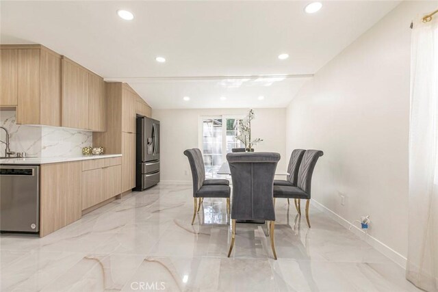 11063 White Oak Ave, Granada Hills, CA 91344 - dining room with light marble finish flooring and recessed lighting
