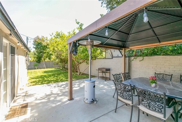 11063 White Oak Ave, Granada Hills, CA 91344 - fenced backyard with a gazebo, outdoor dining area, and a patio area