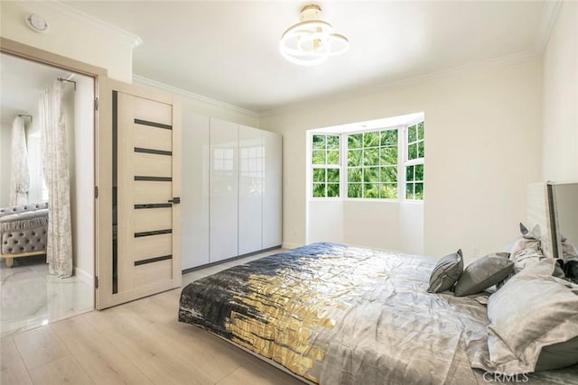 11063 White Oak Ave, Granada Hills, CA 91344 - bedroom featuring light wood finished floors and ornamental molding