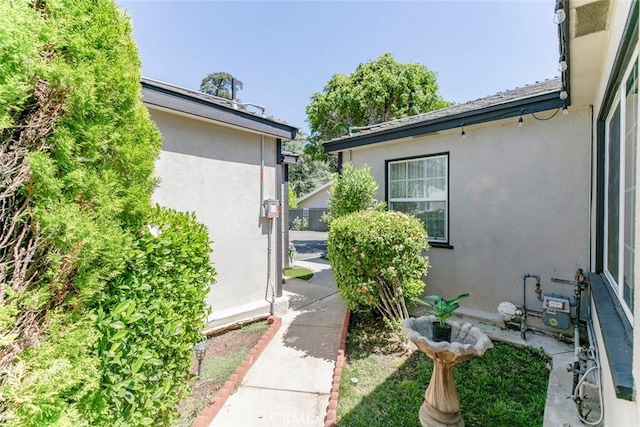 11063 White Oak Ave, Granada Hills, CA 91344 - doorway to property with stucco siding