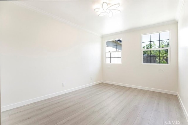 11063 White Oak Ave, Granada Hills, CA 91344 - spare room with ornamental molding and light wood-type flooring