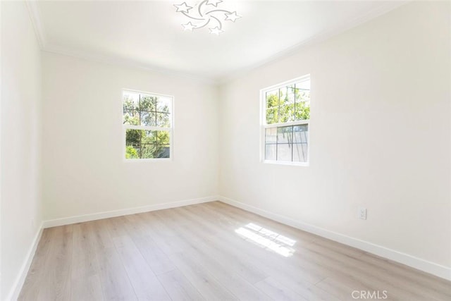 11063 White Oak Ave, Granada Hills, CA 91344 - spare room featuring light wood-type flooring and crown molding