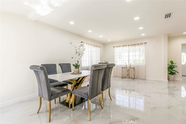 11063 White Oak Ave, Granada Hills, CA 91344 - dining space featuring light marble finish flooring and recessed lighting