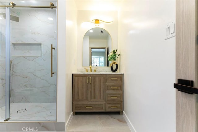 11063 White Oak Ave, Granada Hills, CA 91344 - bathroom with marble finish floors, a marble finish shower, and vanity