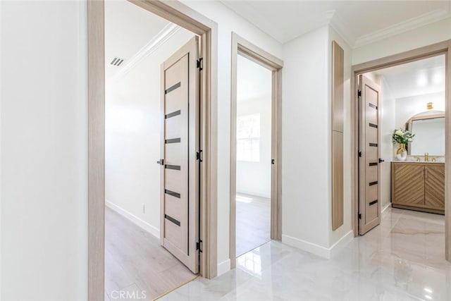 11063 White Oak Ave, Granada Hills, CA 91344 - hallway with ornamental molding and a sink