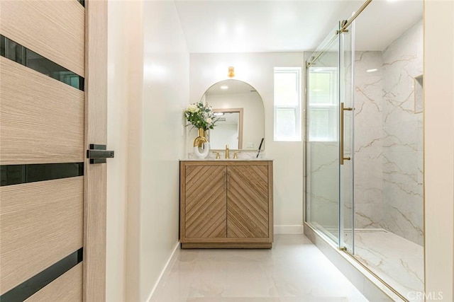 11063 White Oak Ave, Granada Hills, CA 91344 - full bathroom featuring marble look tile flooring, a marble finish shower, and vanity