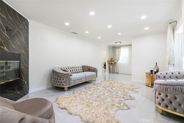 11063 White Oak Ave, Granada Hills, CA 91344 - living room featuring crown molding, recessed lighting, marble tiled floors, an accent wall, and a high end fireplace