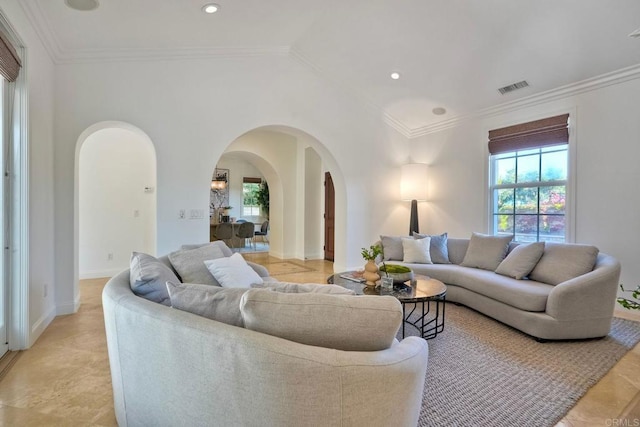14317 Salida Del Sol, San Diego, CA 92127 - living area featuring arched walkways, plenty of natural light, ornamental molding, and recessed lighting