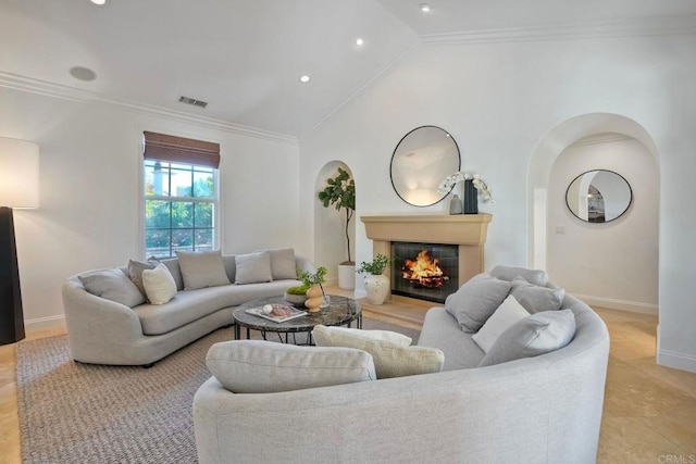 14317 Salida Del Sol, San Diego, CA 92127 - living area with a glass covered fireplace, vaulted ceiling, recessed lighting, ornamental molding, and arched walkways