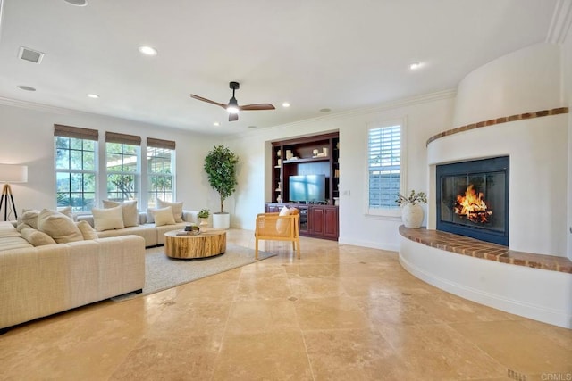 14317 Salida Del Sol, San Diego, CA 92127 - living area featuring ceiling fan, crown molding, a large fireplace, and recessed lighting