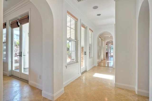 14317 Salida Del Sol, San Diego, CA 92127 - entrance foyer featuring arched walkways, healthy amount of natural light, crown molding, and light tile patterned floors