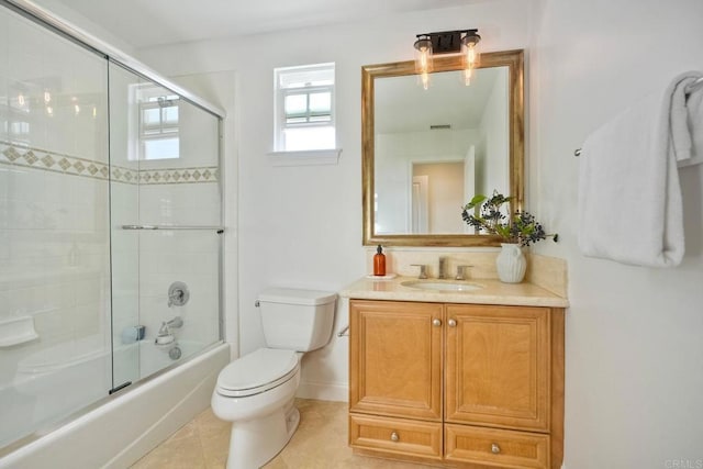 14317 Salida Del Sol, San Diego, CA 92127 - bathroom with vanity, combined bath / shower with glass door, and tile patterned flooring