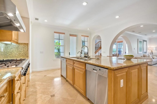 14317 Salida Del Sol, San Diego, CA 92127 - kitchen featuring stainless steel appliances, exhaust hood, light stone counters, open floor plan, and backsplash