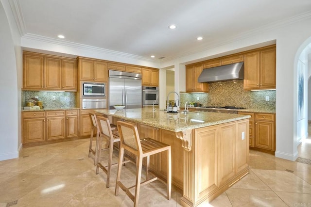 14317 Salida Del Sol, San Diego, CA 92127 - kitchen with wall chimney exhaust hood, built in appliances, a warming drawer, decorative backsplash, and crown molding