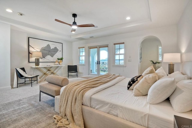 14317 Salida Del Sol, San Diego, CA 92127 - carpeted bedroom with a raised ceiling, multiple windows, access to exterior, arched walkways, and recessed lighting