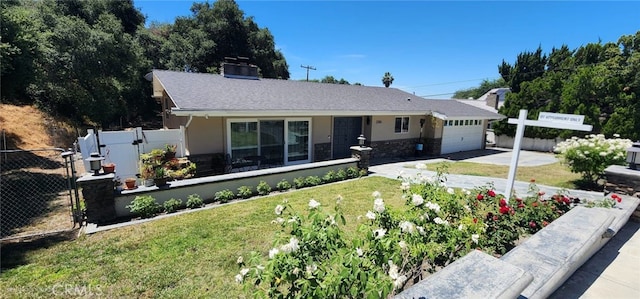 2350 Oak Park Rd, Glendora, CA 91741 - ranch-style home featuring an attached garage, driveway, stone siding, a gate, and a chimney