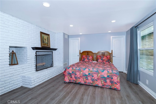 2350 Oak Park Rd, Glendora, CA 91741 - bedroom with wood finished floors, a brick fireplace, and recessed lighting