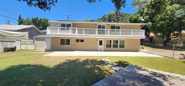 2350 Oak Park Rd, Glendora, CA 91741 - rear view of property featuring a balcony, stucco siding, a patio area, and a gate
