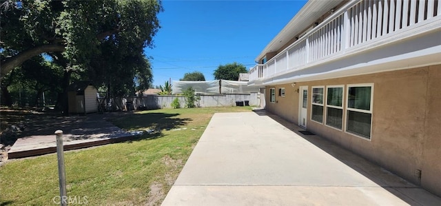 2350 Oak Park Rd, Glendora, CA 91741 - fenced backyard with a patio area and a storage shed