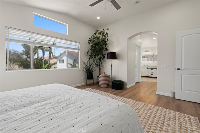 401 Lupine Way, Oceanside, CA 92057 - bedroom featuring arched walkways, wood finished floors, recessed lighting, and ceiling fan