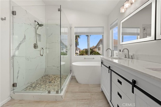 401 Lupine Way, Oceanside, CA 92057 - full bathroom with a freestanding tub, a marble finish shower, double vanity, marble finish floors, and vaulted ceiling