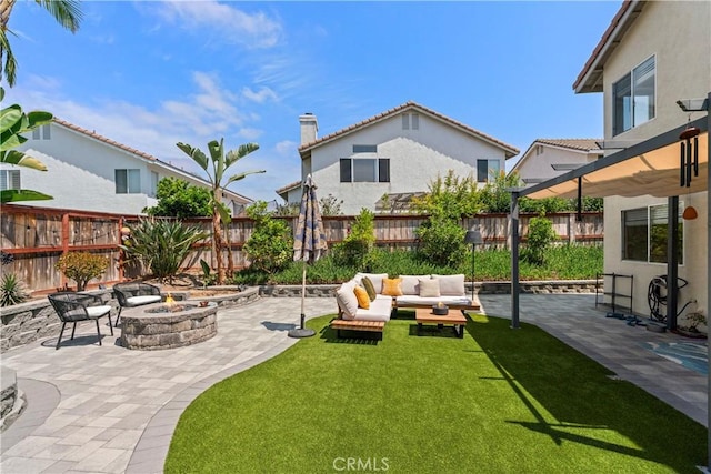 401 Lupine Way, Oceanside, CA 92057 - fenced backyard featuring a patio and an outdoor living space with a fire pit