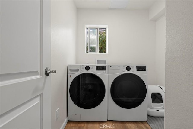 401 Lupine Way, Oceanside, CA 92057 - washroom with washing machine and clothes dryer and wood finished floors