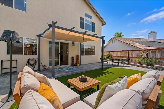 401 Lupine Way, Oceanside, CA 92057 - back of property with an outdoor living space with a fire pit, a pergola, a patio area, and stucco siding