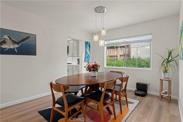 401 Lupine Way, Oceanside, CA 92057 - dining room with light wood-type flooring and baseboards