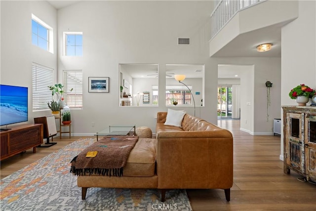 401 Lupine Way, Oceanside, CA 92057 - living area with a towering ceiling and wood finished floors