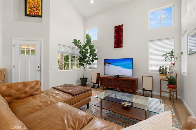 401 Lupine Way, Oceanside, CA 92057 - living room with a high ceiling, wood finished floors, and recessed lighting