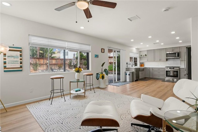 401 Lupine Way, Oceanside, CA 92057 - living room with light wood-type flooring, recessed lighting, and a ceiling fan