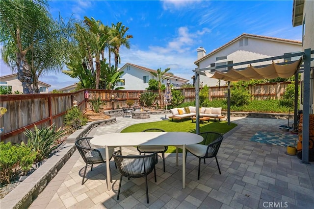 401 Lupine Way, Oceanside, CA 92057 - fenced backyard with outdoor dining space, a patio area, and an outdoor living space with a fire pit