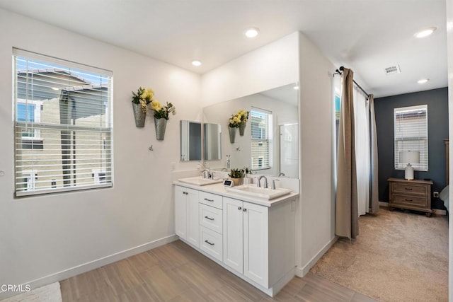 1979 Tangelo Way, Santa Paula, CA 93060 - full bathroom with double vanity, plenty of natural light, recessed lighting, and an enclosed shower