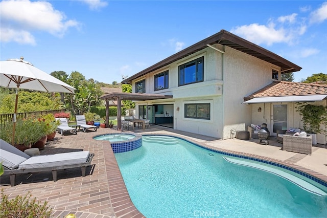 1579 Via Parque, Thousand Oaks, CA 91360 - back of property featuring a patio area, a pool with connected hot tub, and stucco siding