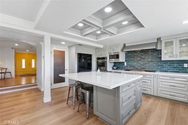 1579 Via Parque, Thousand Oaks, CA 91360 - kitchen with beverage cooler, appliances with stainless steel finishes, gray cabinets, light countertops, and a breakfast bar