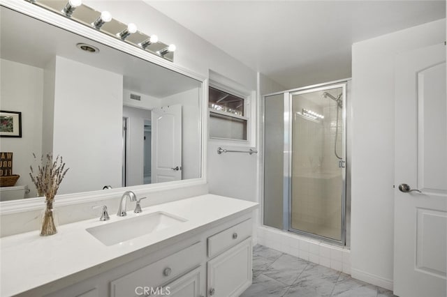 1579 Via Parque, Thousand Oaks, CA 91360 - full bathroom featuring marble look tile flooring, vanity, and a stall shower