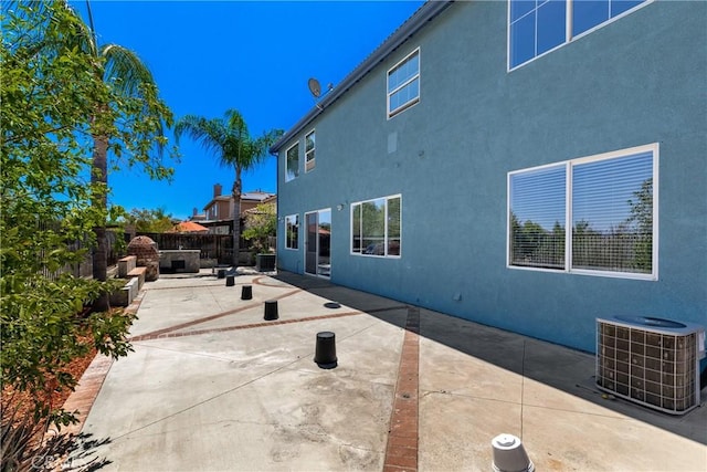 32522 Safflower St, Winchester, CA 92596 - rear view of property with a fenced backyard, stucco siding, and a patio area