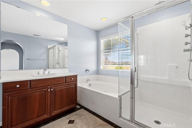 32522 Safflower St, Winchester, CA 92596 - full bathroom featuring tile patterned flooring, a stall shower, a bath, and vanity