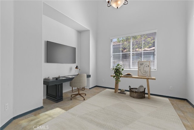 32522 Safflower St, Winchester, CA 92596 - tiled office with baseboards and a towering ceiling