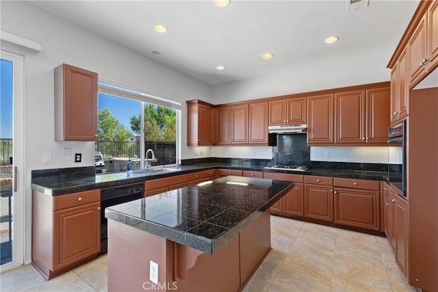 32522 Safflower St, Winchester, CA 92596 - kitchen with black appliances, tile counters, under cabinet range hood, recessed lighting, and a center island