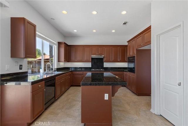 32522 Safflower St, Winchester, CA 92596 - kitchen featuring black appliances, a center island, recessed lighting, tile countertops, and a kitchen breakfast bar
