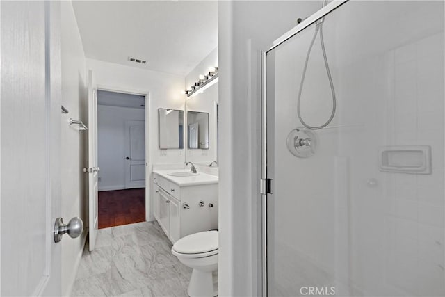 32522 Safflower St, Winchester, CA 92596 - full bathroom featuring marble look tiles, vanity, and a shower stall