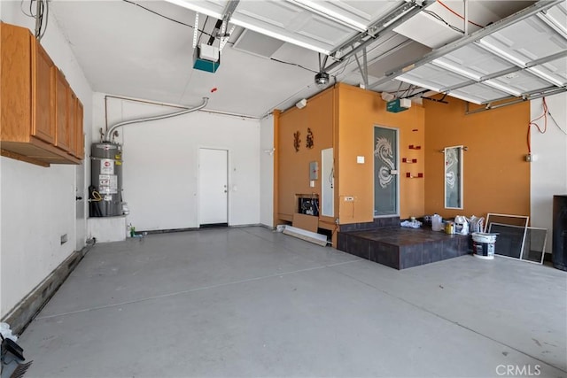 32522 Safflower St, Winchester, CA 92596 - garage with secured water heater and a garage door opener