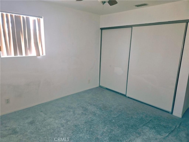 38644 Palms Pl, Palmdale, CA 93552 - unfurnished bedroom featuring carpet floors, a closet, and a ceiling fan