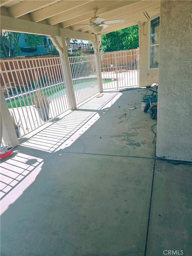 38644 Palms Pl, Palmdale, CA 93552 - fenced backyard with a patio and ceiling fan