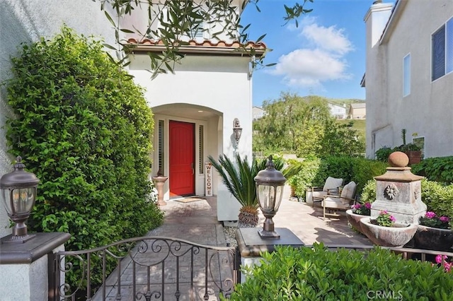 29160 Harmony Way, Saugus, CA 91390 - view of exterior entry featuring stucco siding and a gate