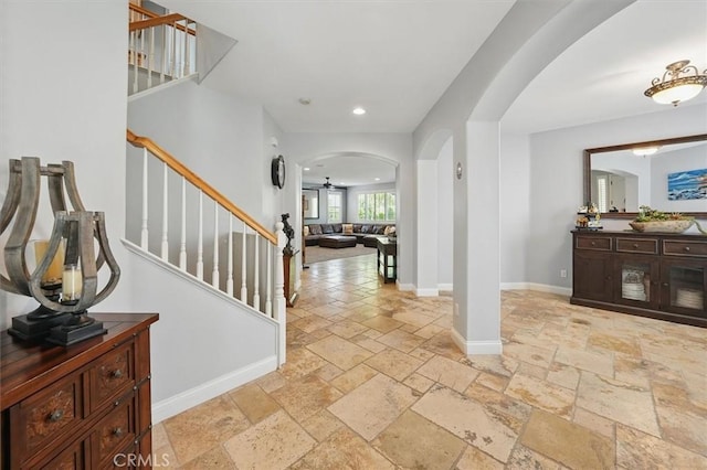 29160 Harmony Way, Saugus, CA 91390 - entrance foyer with arched walkways, stone tile flooring, stairs, recessed lighting, and a ceiling fan